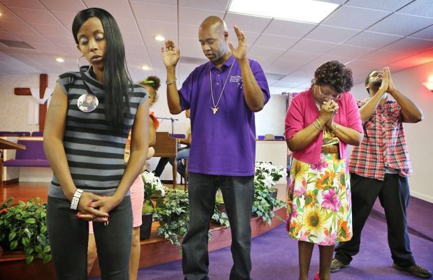 Prayers and tears dominate Ferguson Sunday